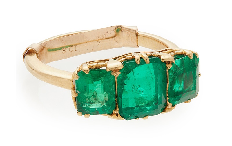 Lot 98 - A three stone Colombian emerald set ring  Estimate: £2,500 - £4,000